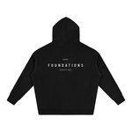 Wolvyn Apparel Foundations 002 oversized black fleeced hoodie, back view with FOUNDATIONS and SERIES 002.