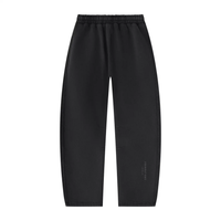 Wolvyn Apparel Foundations Layer 002 unisex black vintage wash fleece sweatpants with elastic waistband, barrel-leg fit