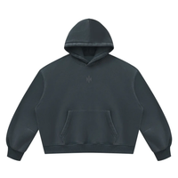 Wolvyn Apparel Foundations Layer 002 vintage wash boxy fleece hoodie, front view with hood up and kangaroo pocket.