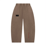 Unisex mineral-wash barrel-leg pants, Villain by Wolvyn Apparel in brown with ODMPOD branding