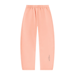 Wolvyn Apparel Foundations Layer 002 peach fleece sweatpants, elastic waistband, barrel legs, front view.
