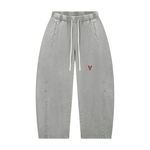 Pants: Villain by Wolvyn Disruptor unisex gray mineral-wash barrel-leg pants with a red V logo