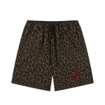 Villain by Wolvyn leopard print shorts with black drawstring and red logo.