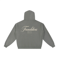 Grey fleece hoodie back view with cream Foundations Script and Wolvyn Apparel branding, Series 002.