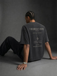 Tshirt: Wolvyn Apparel Foundations Stone vintage-washed oversized boxy tee in charcoal gray with back print