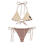 Beige and maroon heart print string bikini set with adjustable ties, flat lay on white background.