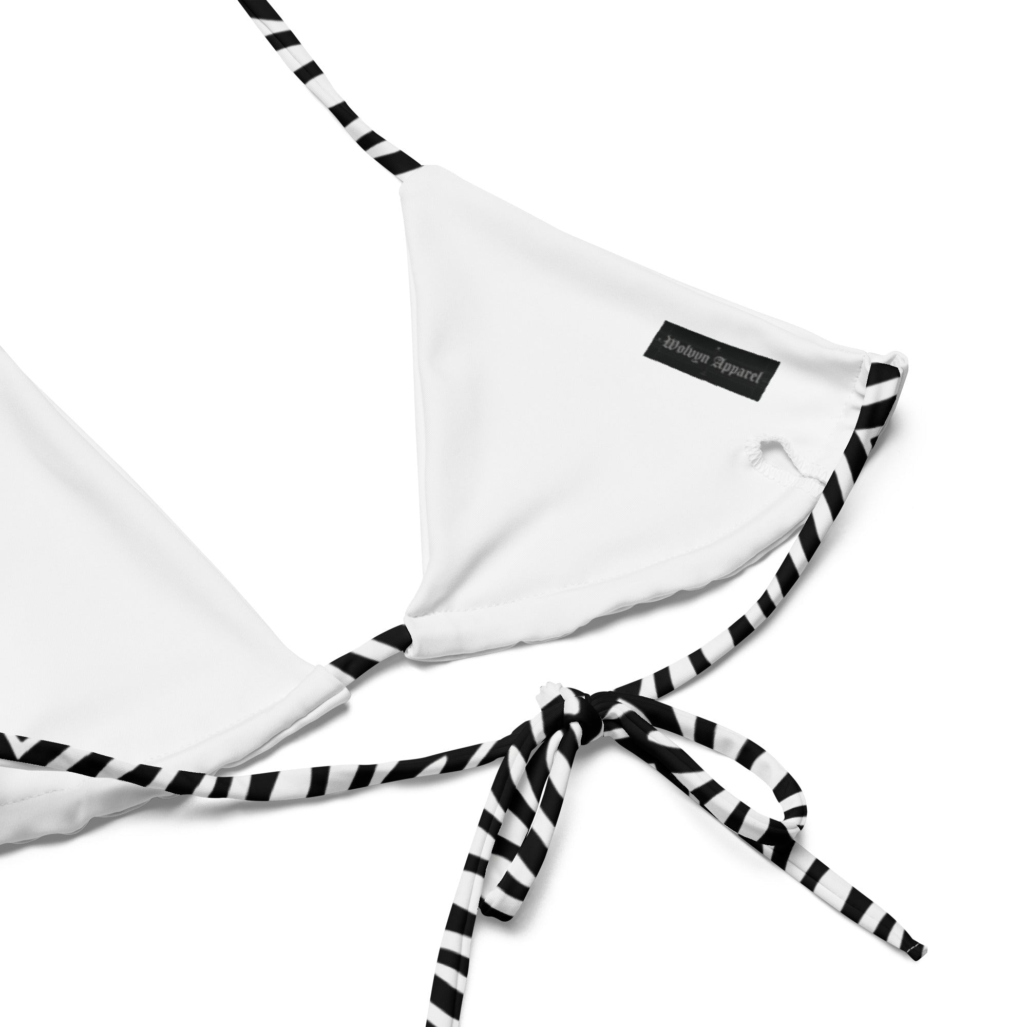 White triangle bikini top with black and white striped ties and a visible woven label