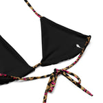 Black triangle bikini top with leopard print and pink accent string ties