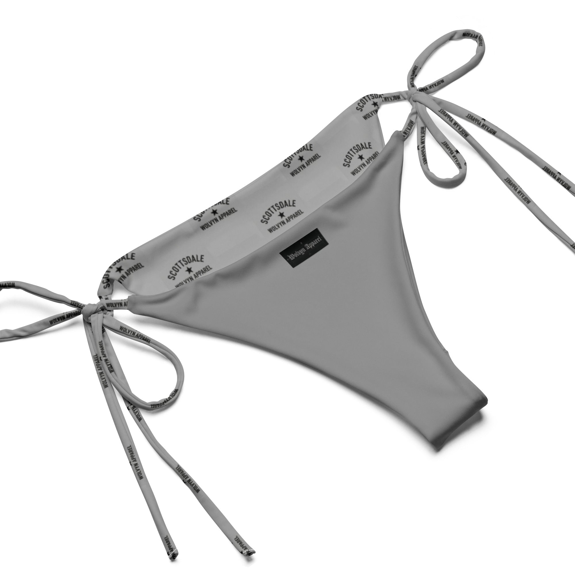 Gray string bikini bottom with tie sides and logo detail, laid flat on white background