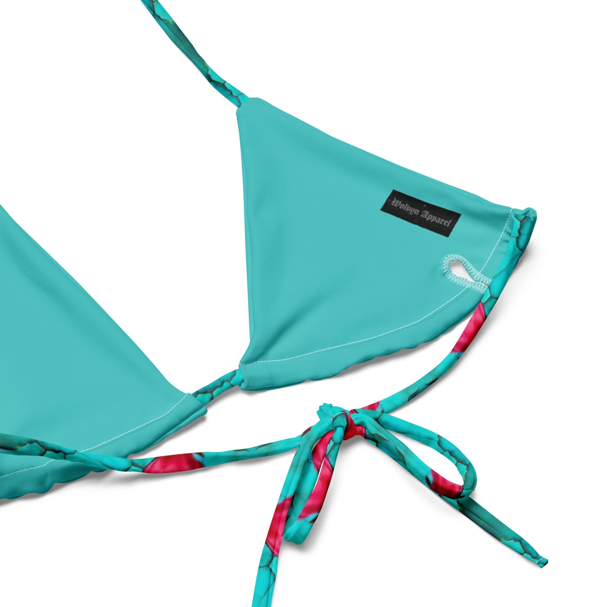 Turquoise string bikini top with multicolor straps, recycled fabric, close-up view