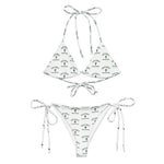 White string bikini set with Scottsdale cactus print and adjustable ties, laid flat on white background