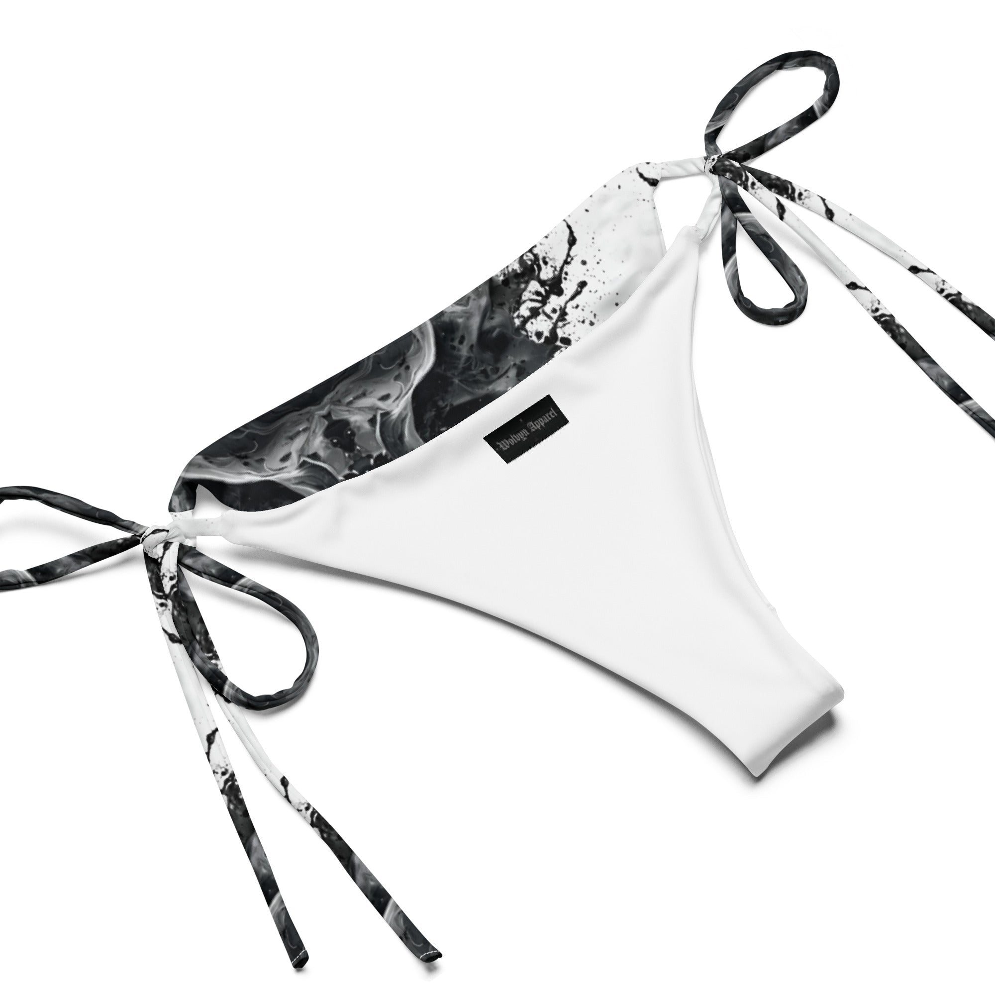 White string bikini bottom with black marble print ties and lining, recycled fabric
