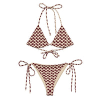 Beige string bikini set with maroon heart print, tie straps, eco-friendly swimwear.