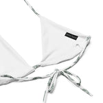 White recycled string bikini top with printed ties and small black logo tag on white background