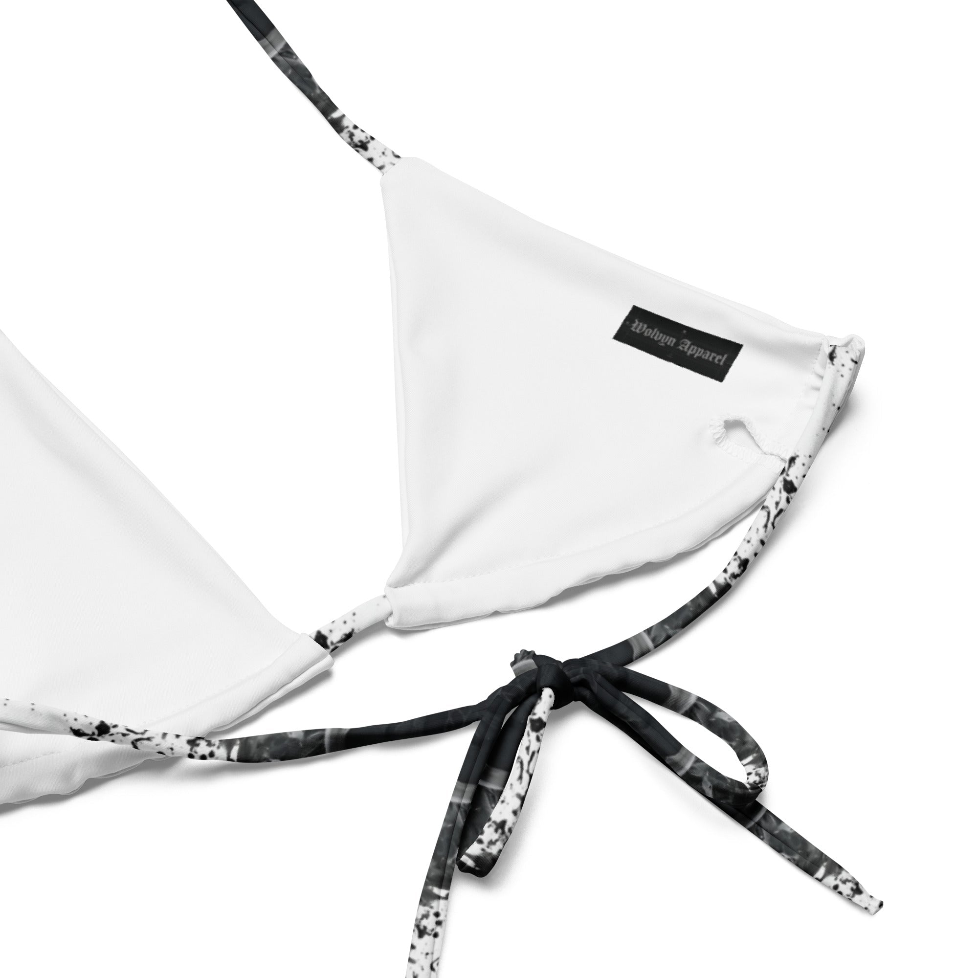 White recycled string bikini top with black and white tie detail and label patch