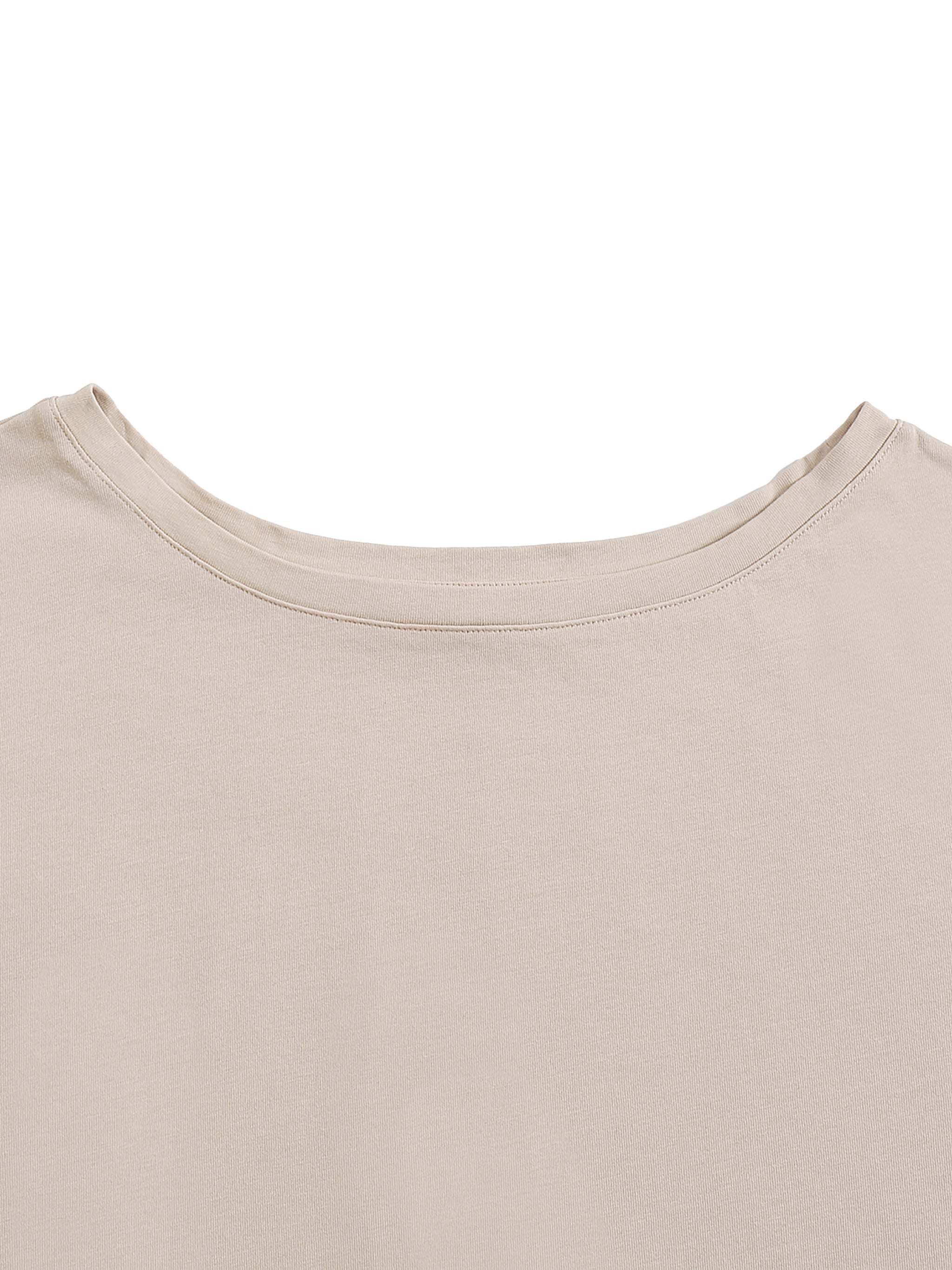 Back view of beige oversized cotton t-shirt with asymmetric shoulder neckline