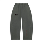 Villain Disruptor pants for unisex in charcoal gray mineral-wash with barrel-leg cut and red Villain logo on leg