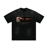 Wolvyn First Touch hand-frayed sunfade T-shirt; black tee with hands graphic and House of Wolvyn MMXXVI.