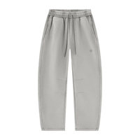 Wolvyn Apparel Foundations Layer 002 unisex grey vintage-wash fleece sweatpants, barrel-leg, drawstring, flat lay.
