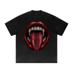 ODMPOD Wolvyn Apparel heavyweight drop-shoulder tee in black with front red lips, diamond fangs, and WOLVYN on tongue