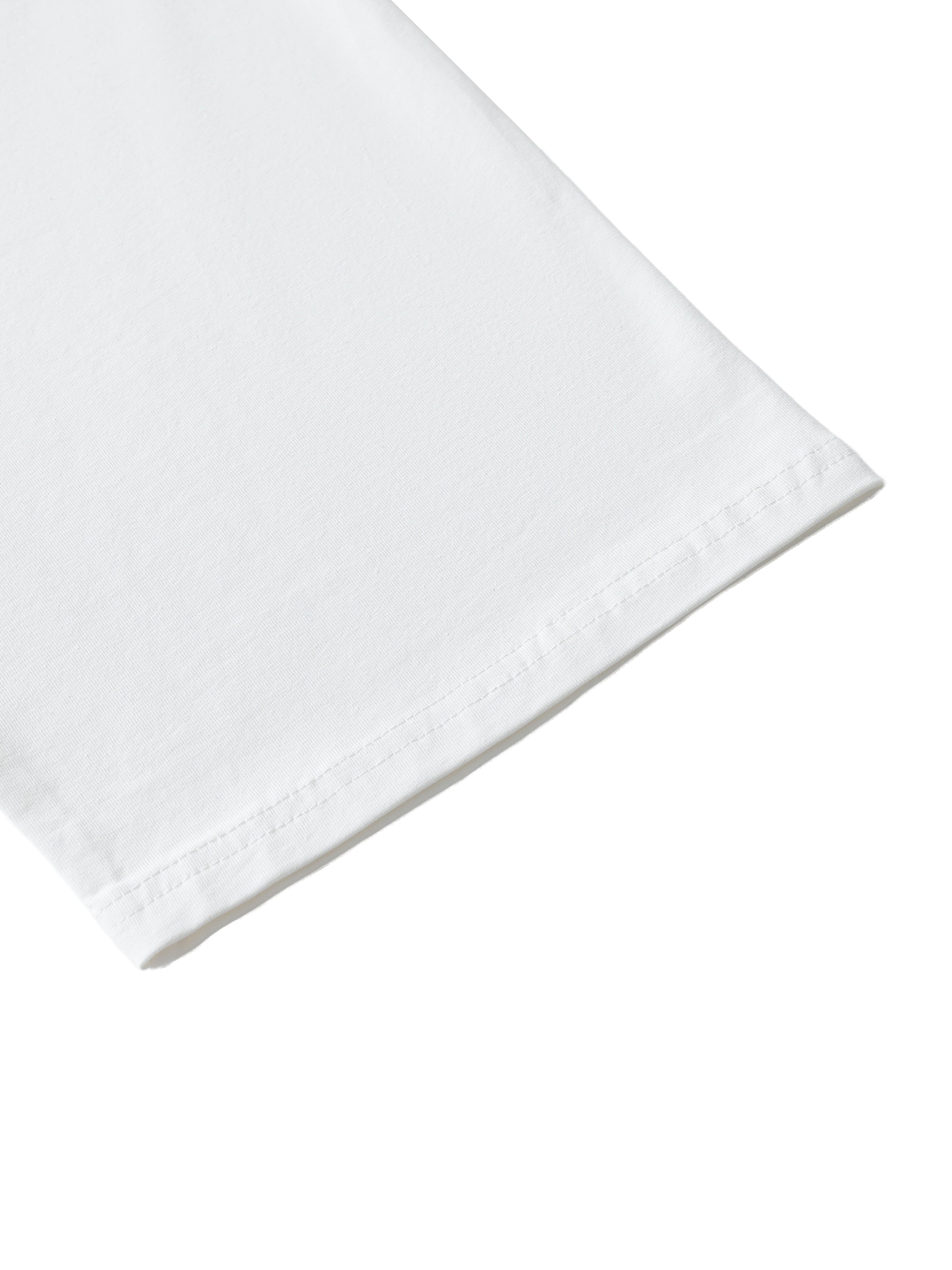 Closeup of white short sleeve ribbed t-shirt fabric with clean stitched hem