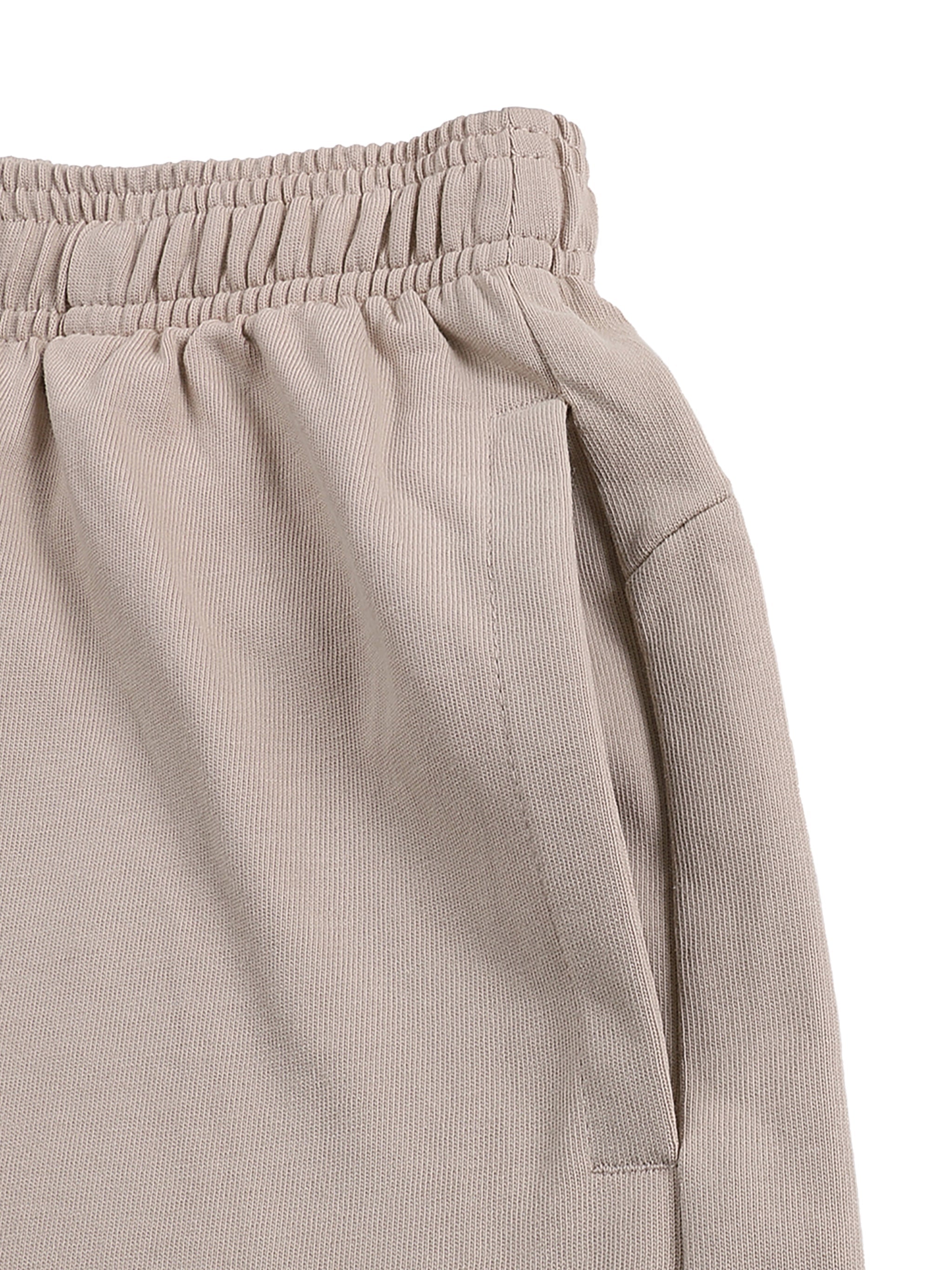 Beige heavyweight cotton shorts with elastic waistband and deep side pocket