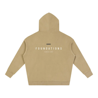 Wolvyn Apparel Foundations 002 Oversize Fleeced Hoodie back view in tan with white FOUNDATIONS text across the back.