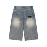 Wolvyn Apparel vintage wash baggy denim shorts with faded back pockets and a visible label patch on the rear right pocket