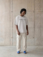 Tshirt Foundations Stone oversized boxy tee with black text, vintage washed by Wolvyn Apparel