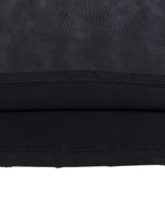 Tshirt Wolvyn Apparel Curated Collection fabric close-up in black with visible stitching