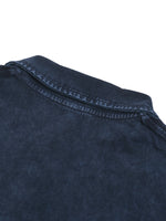 Close-up of a heavyweight dark blue washed streetwear shirt collar detail