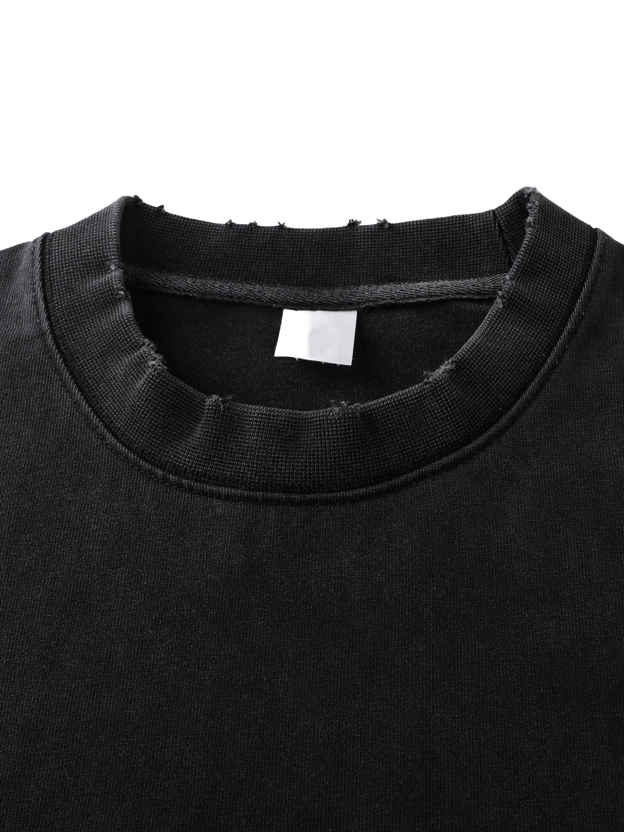 Close-up of black heavyweight streetwear crewneck with distressed neckline detail