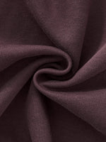 Close-up of heavyweight plum-colored knit streetwear fabric texture, twisted detail
