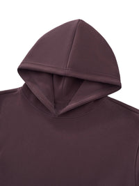 Close-up of a heavyweight purple hooded sweatshirt with clean seam details