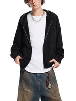 Zippered hoodie, black fleece with frayed raw-edge detailing worn over a white t-shirt