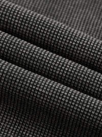 Wolvyn Apparel ODMPOD mineral wash waffle knit T-shirt fabric close-up in charcoal gray