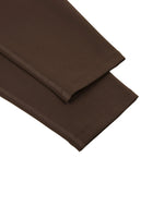 Wolvyn Apparel Standard Issue high-waisted yoga leggings, brown stretch fabric, flat lay with folded hems