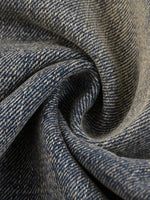 Wolvyn Apparel Vintage Wash Baggy Denim Shorts fabric close-up in blue indigo denim texture