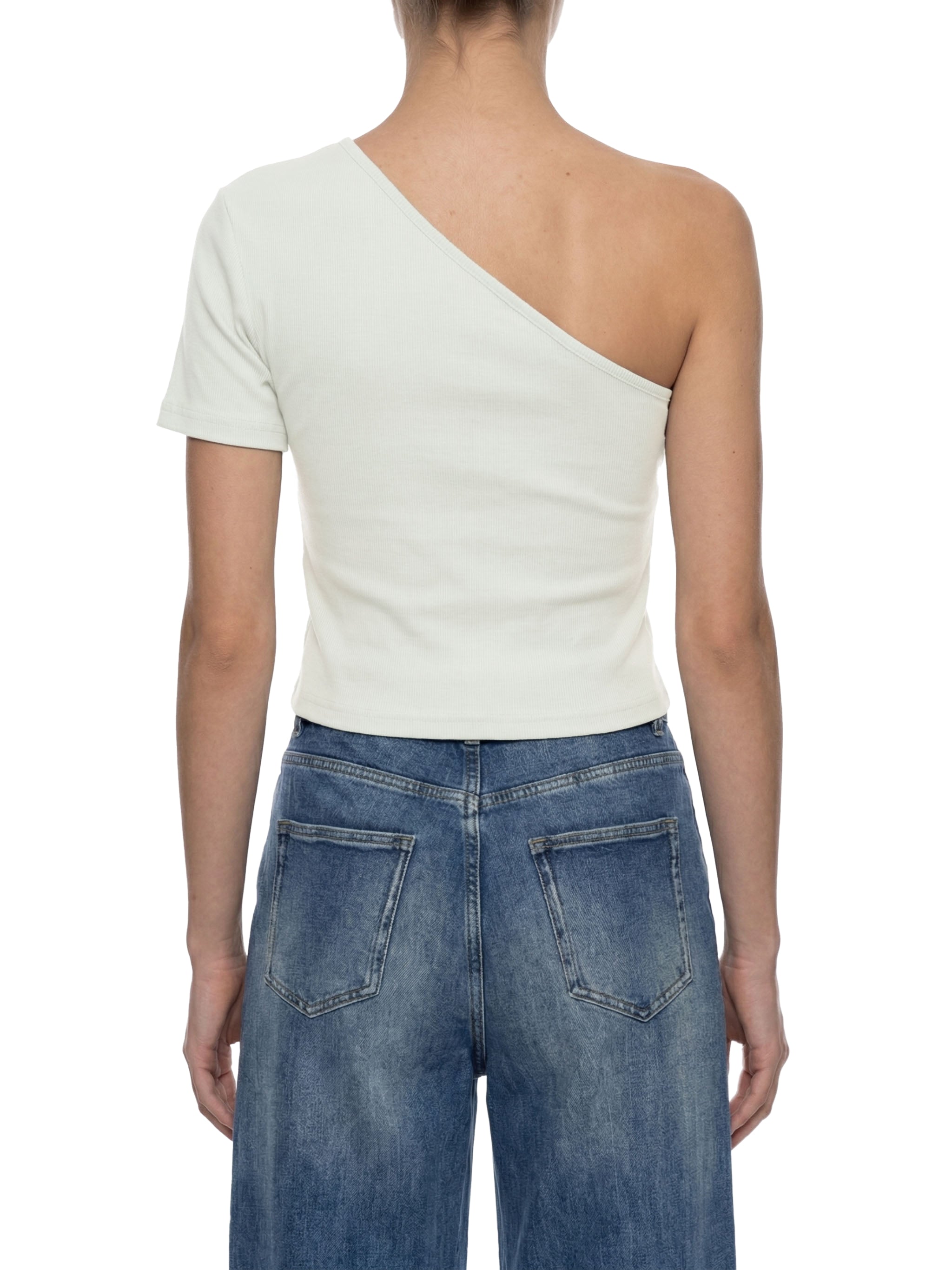 Back view of woman in white one-shoulder ribbed top and blue relaxed-fit jeans