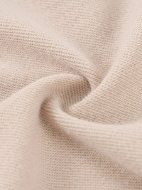 Hoodie fabric close-up in beige, showcasing a soft, textured knit