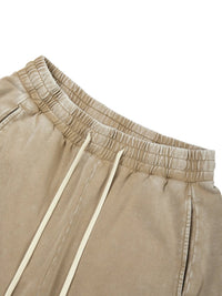 Pants: Villain Disruptor unisex mineral-wash barrel-leg pants in beige with cream drawstrings