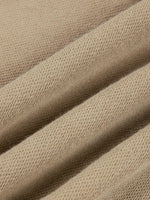 Pants fabric close-up in beige knit texture by ODMPOD