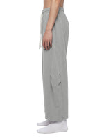 Villain Disruptor unisex mineral-wash barrel-leg pants in light gray, side view.