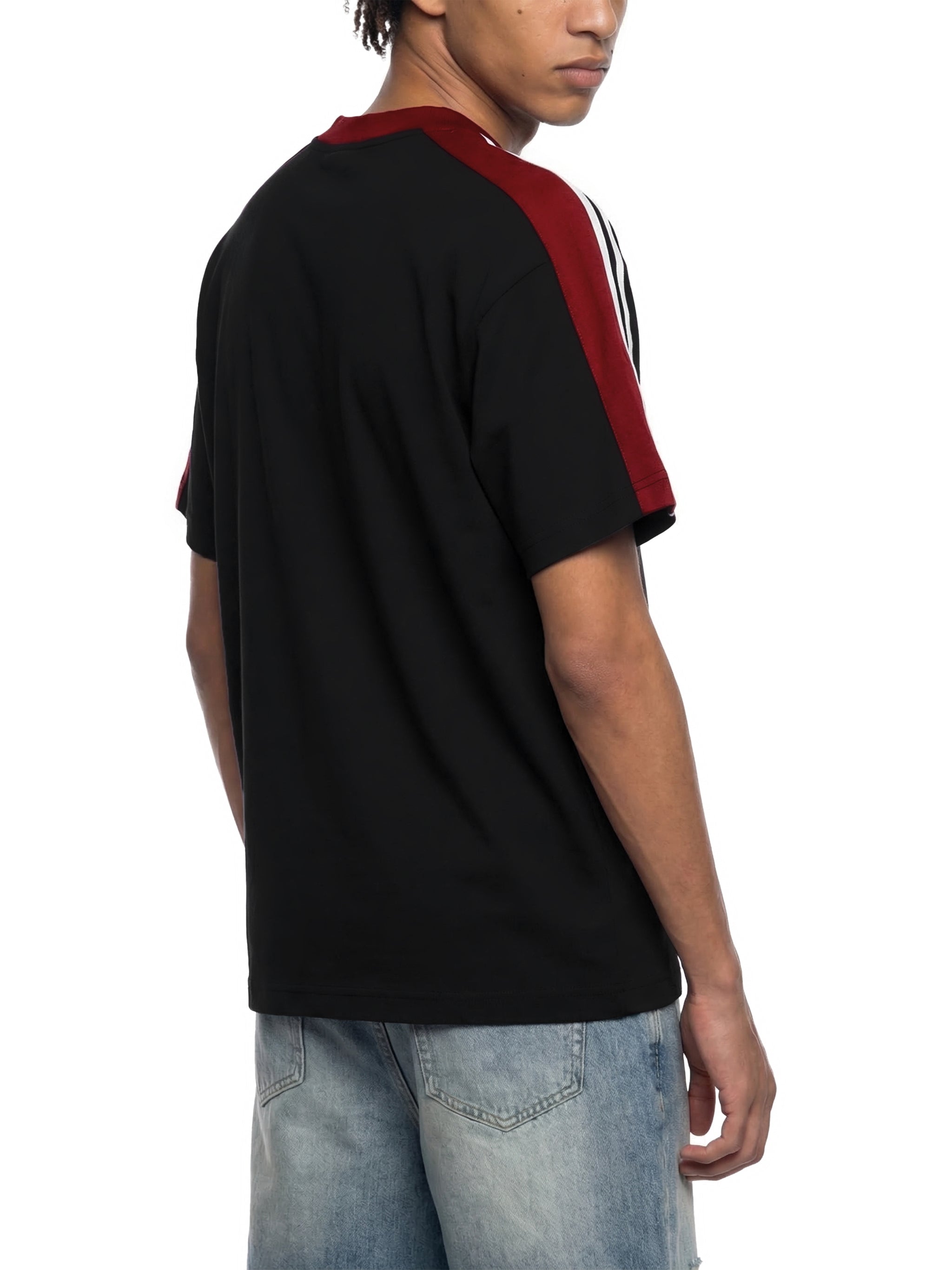 Unisex colorblock striped t-shirt with red and black panels, shown from the back.