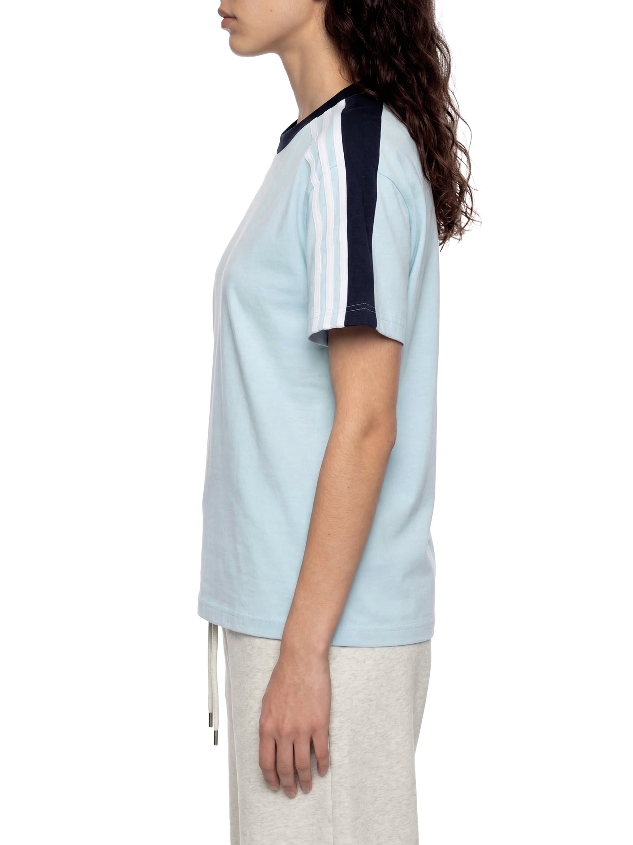 Unisex colorblock striped t-shirt with light blue body and navy shoulder stripes, side view