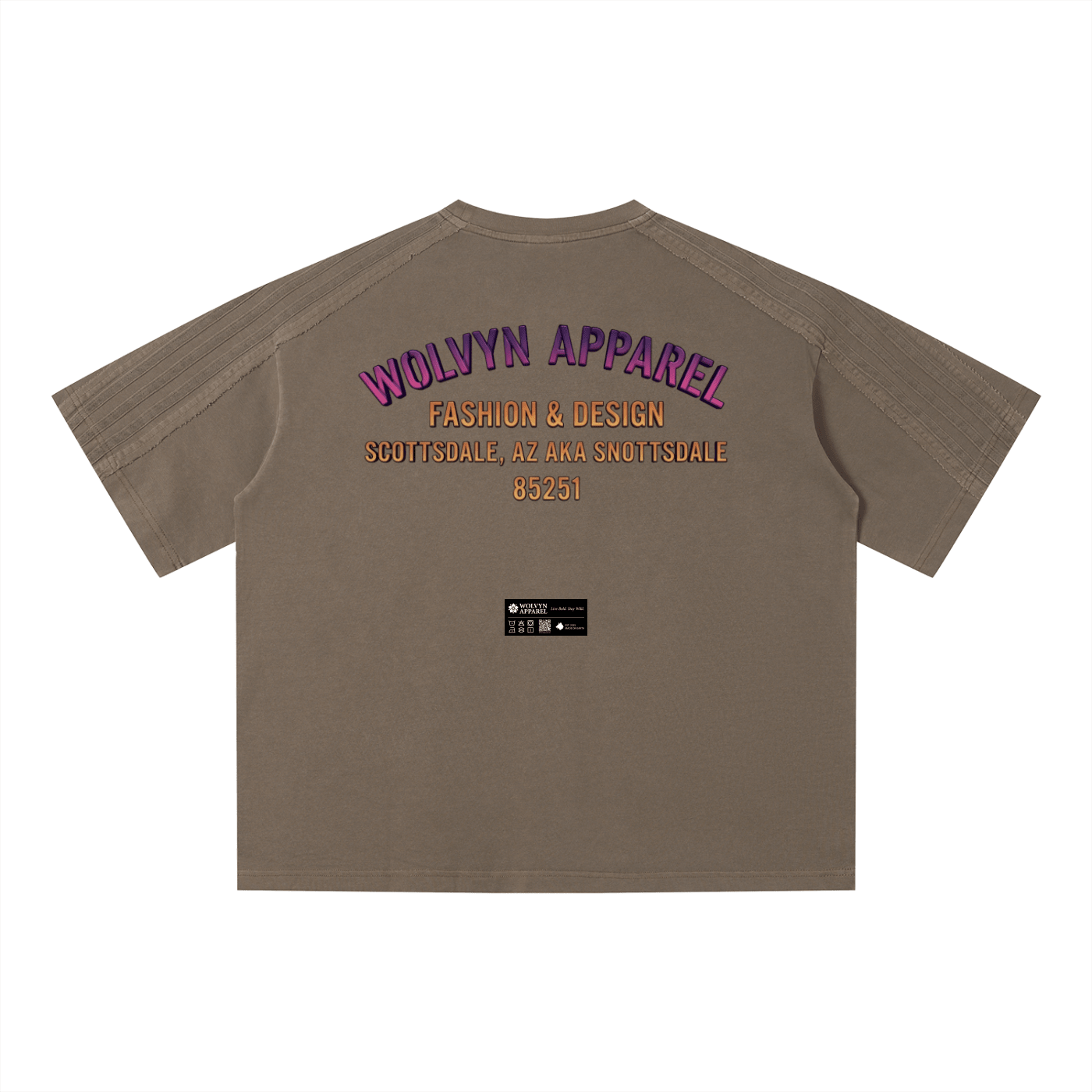 Unisex vintage wash boxy t-shirt in taupe with bold back graphic text in purple and gold.