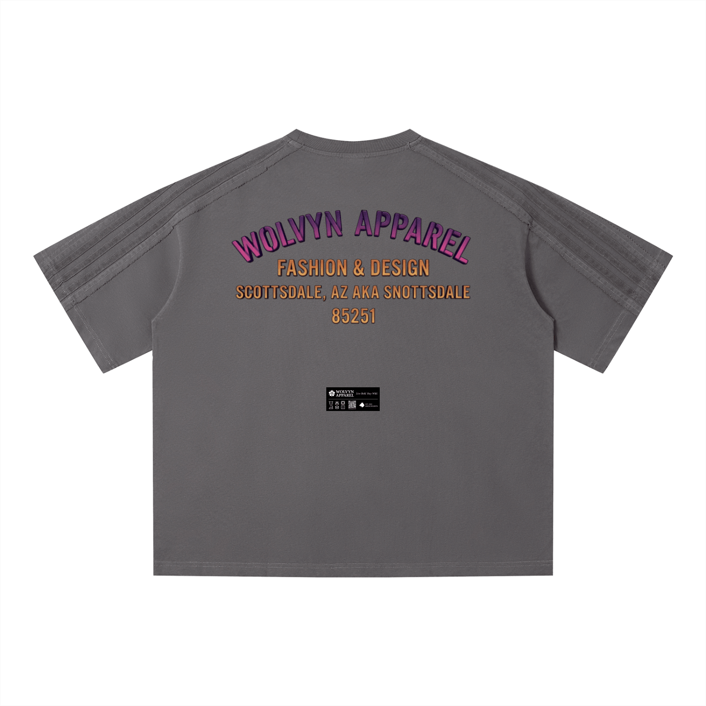 Unisex vintage wash boxy t-shirt in gray with bold back graphic text in purple and gold.