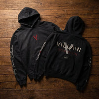 Heavyweight sunfade black hoodie with bold Villain Dominion graphics and script sleeves