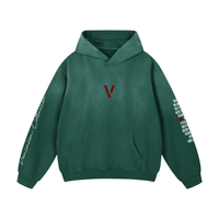 Green heavyweight oversized hoodie with red V logo, sunfade effect, and sleeve text details