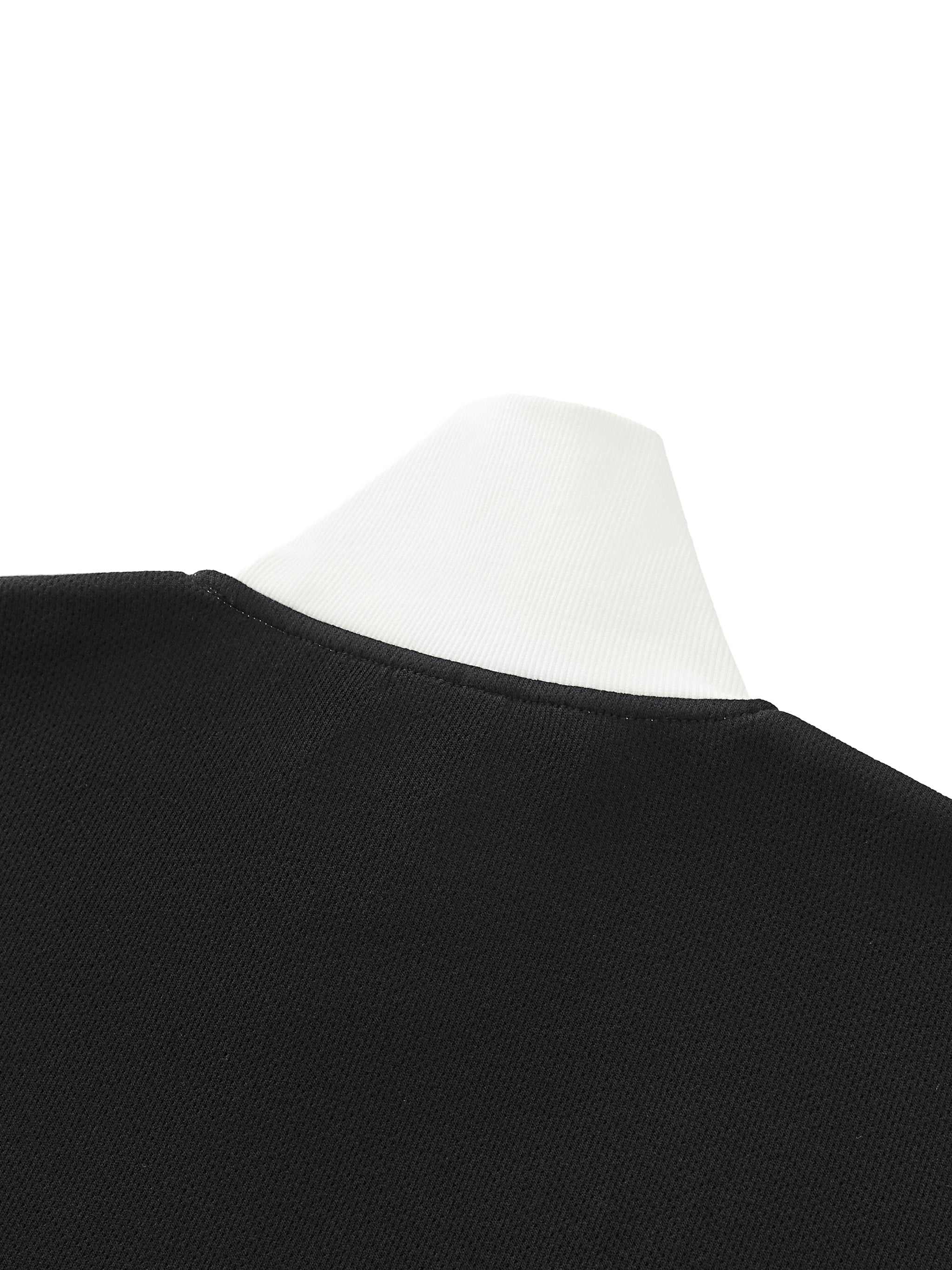 Close-up of black fleece track jacket back collar on white mannequin